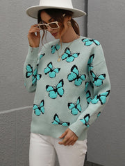 Sky blue knit crewneck sweater with allover butterfly motif