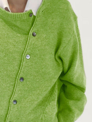 Matcha green knit cardigan with asymmetric button-up front and crew neck.