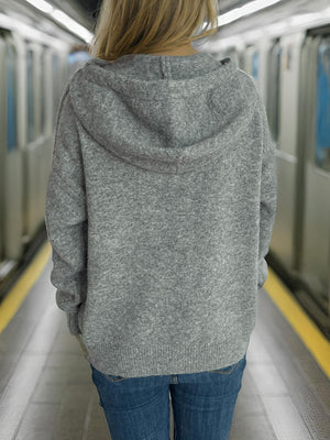 Gray textured knit hoodie with appliqué star detail, casual relaxed fit.