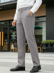 Men's gray classic fit dress pants with pockets and subtle herringbone texture.