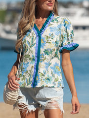 Floral frilled blouse with striped detail, short sleeves, v-neck, cotton fabric.