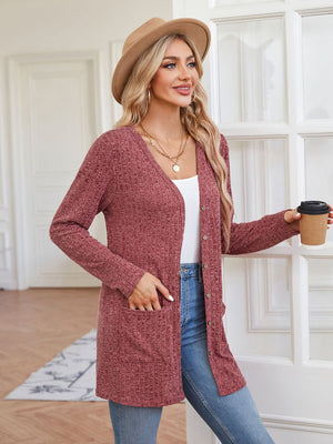 Textured ribbed knit button-down cardigan in Brick Red with pockets and V-neck.