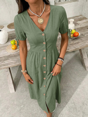 Sage button-down midi dress with v-neck, short puff sleeves with ties, and gathered waist