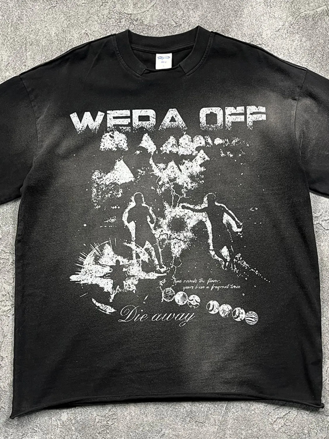 Black distressed graphic tee with "Wera Off" text and abstract figures.
