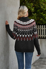 Black turtleneck sweater with geometric pattern in white, grey, and burgundy.