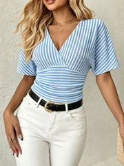Sky blue and white striped surplice t-shirt with smocked waist and batwing sleeves