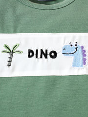 Green cotton tee with embroidered dinosaur and palm tree detail