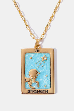 Gold chain necklace with a light blue Strength tarot card pendant and a star detail.