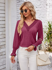Lace trim V-neck blouse with blouson sleeves in dark green.