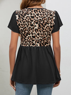 Black peplum blouse with leopard print back panel and short sleeves