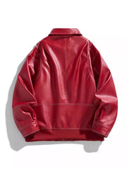 Red oversized leather bomber jacket with white contrast stitching and ribbed hem.