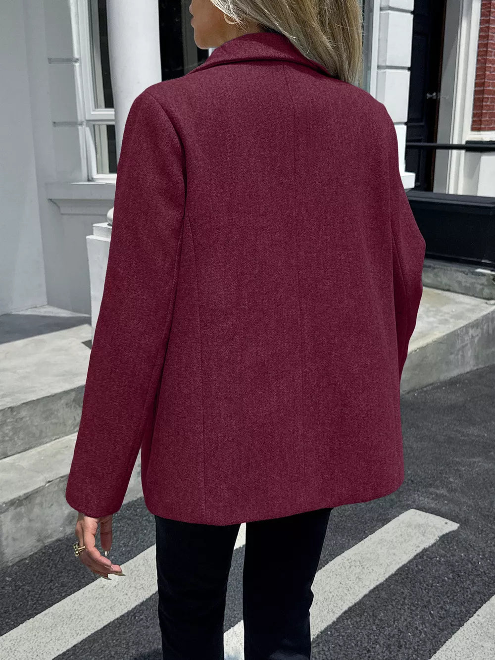 Burgundy blazer with lapel and buttoned front, shown from the back.