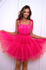 Hot Pink tulle tiered mini dress with bow straps and a square neckline.