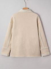 Lined western jacket in eggshell with sherpa collar and cuffs.