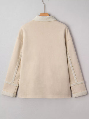 Lined western jacket in eggshell with sherpa collar and cuffs.