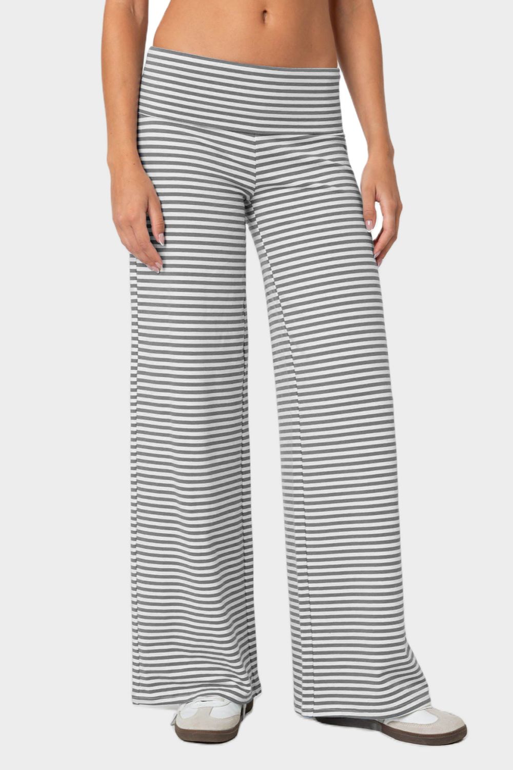 Gray and white striped palazzo pants with a high waist.