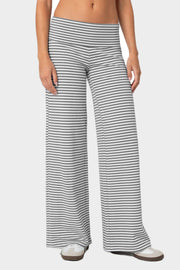 Gray and white striped palazzo pants with a high waist.