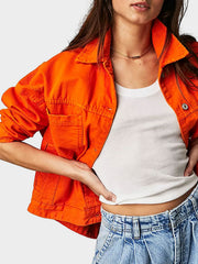 Orange denim utility jacket with button front and chest pockets