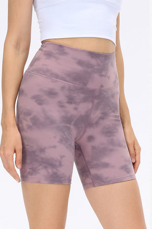 Mauve tie-dye bike shorts with a high waist and sculpted fit.