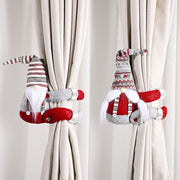 Charming gnome curtain tie-backs in red and grey with festive patterns.