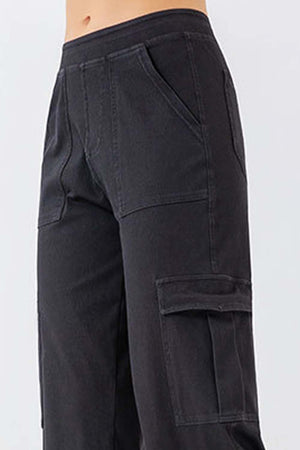 Black denim cargo pants with multiple pockets and a relaxed fit.