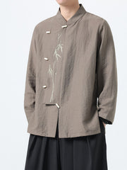 Men's mocha cotton shirt with mandarin collar, bamboo embroidery, and button closure.