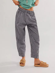 Black gingham check wide-leg pants with pockets and a relaxed fit.