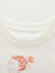 White cotton tee with ruffled sleeve detail and a cute graphic of a girl with a pink bow.