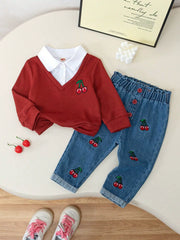 Baby set with red cherry embroidered sweater and jeans.