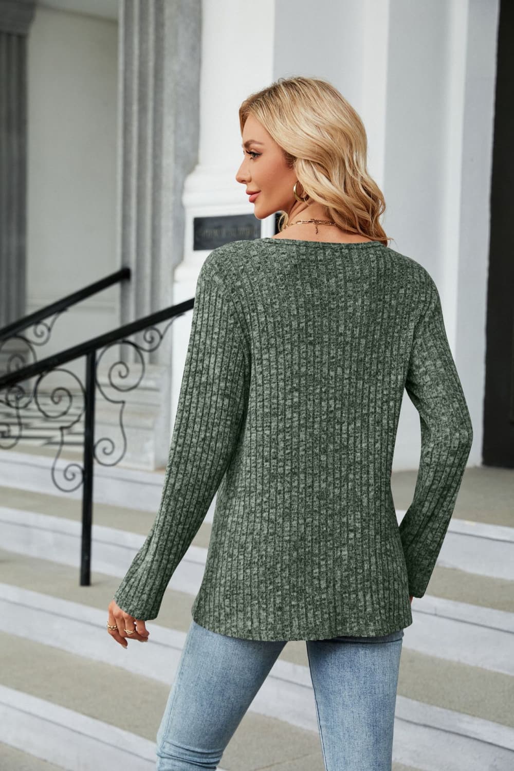 Army green ribbed tunic top with button detail and asymmetric hem.