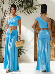 Sky blue one-shoulder ruched crop top and maxi skirt set with gold flower detail