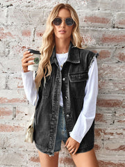 Black raw-edge denim utility vest with button front and chest pockets.