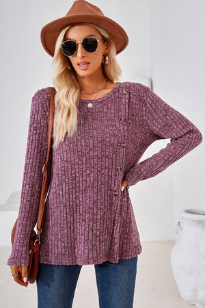 Asymmetric button ribbed knit top in Red-Violet with crew neck and long sleeves.