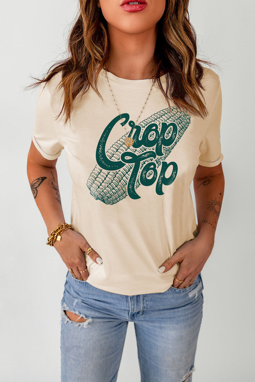 Sand crop top graphic tee with rolled sleeves and corn graphic.