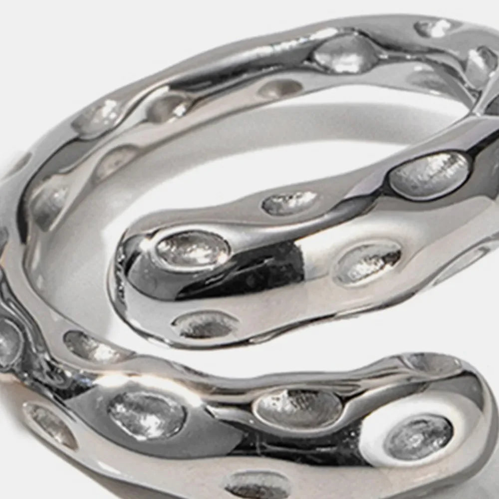 Silver bubble ring with textured surface and 18K gold plating detail.