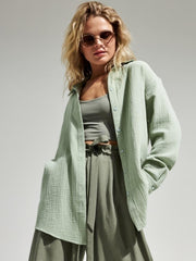 Light green textured cotton overshirt with relaxed fit and button front