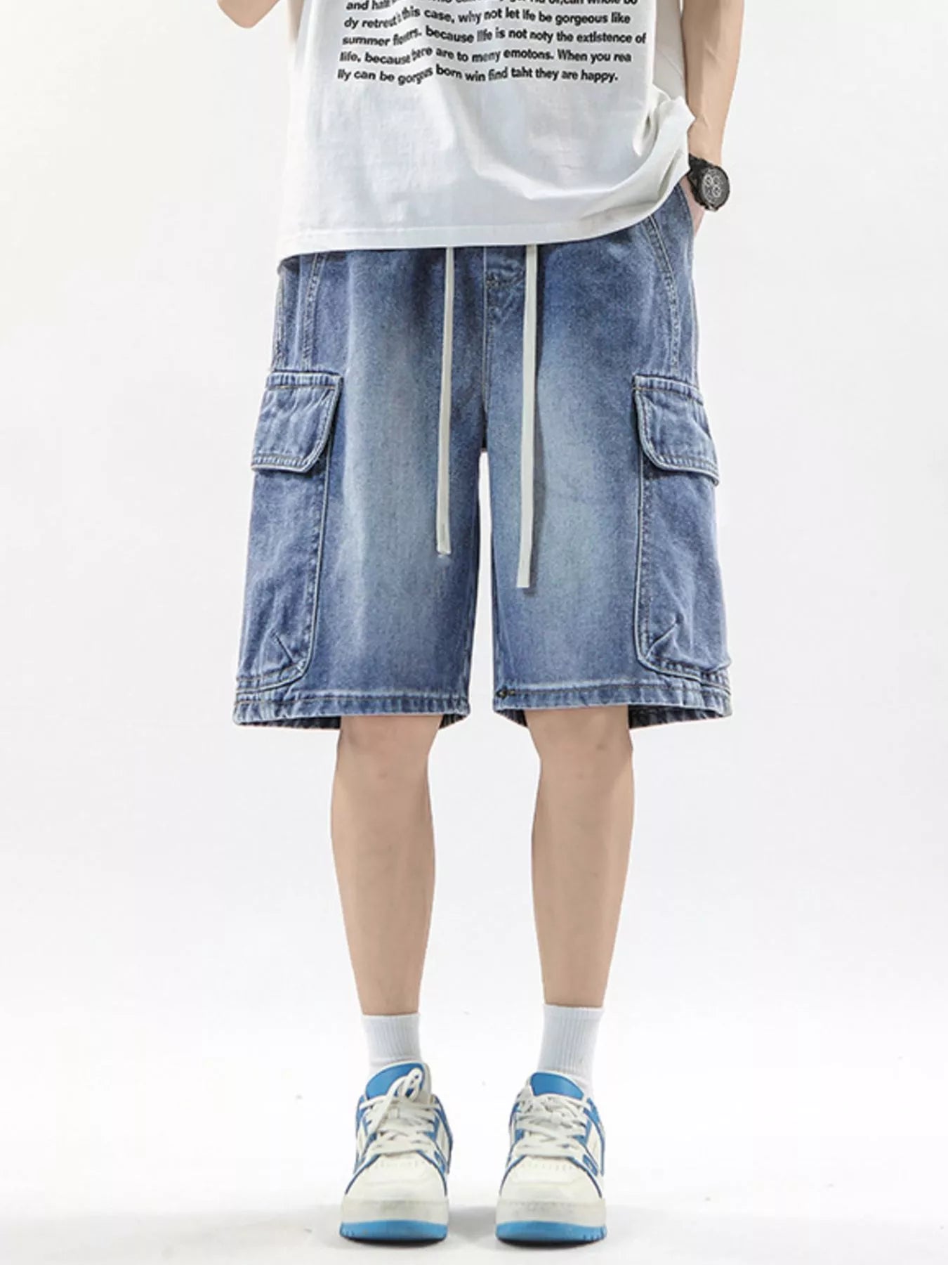 Men's denim cargo shorts in Vintage Blue with drawstring waist and multiple pockets.