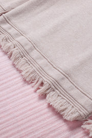 Off-the-shoulder knit sweater in eggshell with fringe trim detail