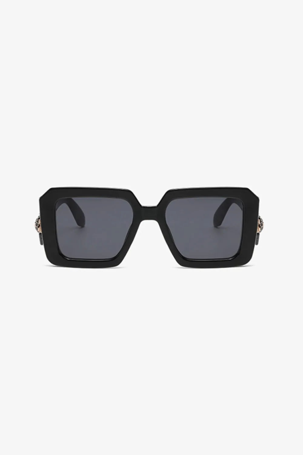 Black geometric facet sunglasses with embellished temples and dark lenses.