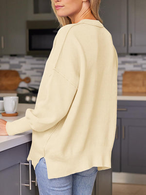 Ribbed-knit relaxed fit sweater in Pastel Yellow with crew neck and long sleeves.