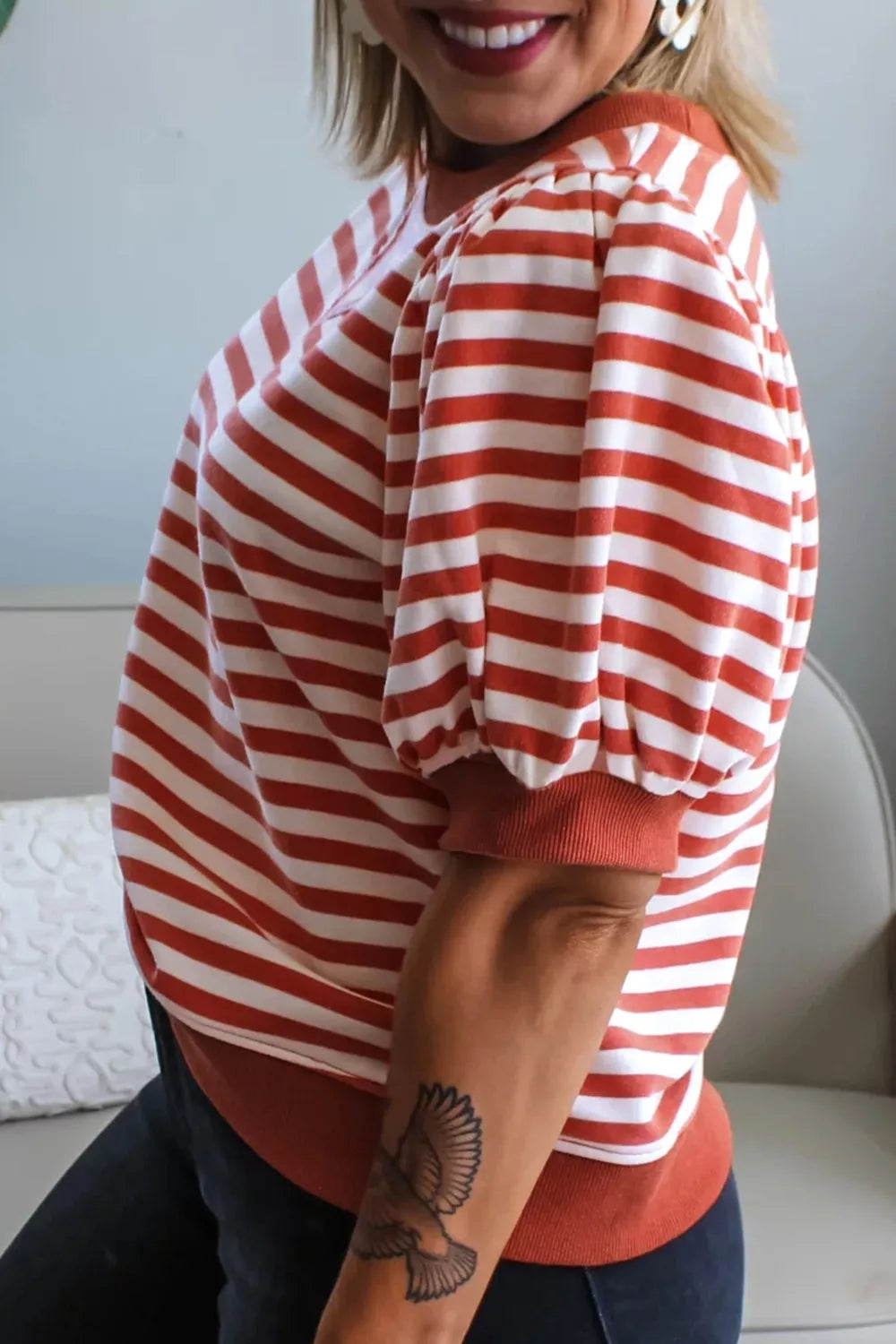 Maternity t-shirt with red and white stripes, puff sleeves, and crew neck.