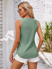 Sage eyelet button-down sleeveless top with a textured pattern.
