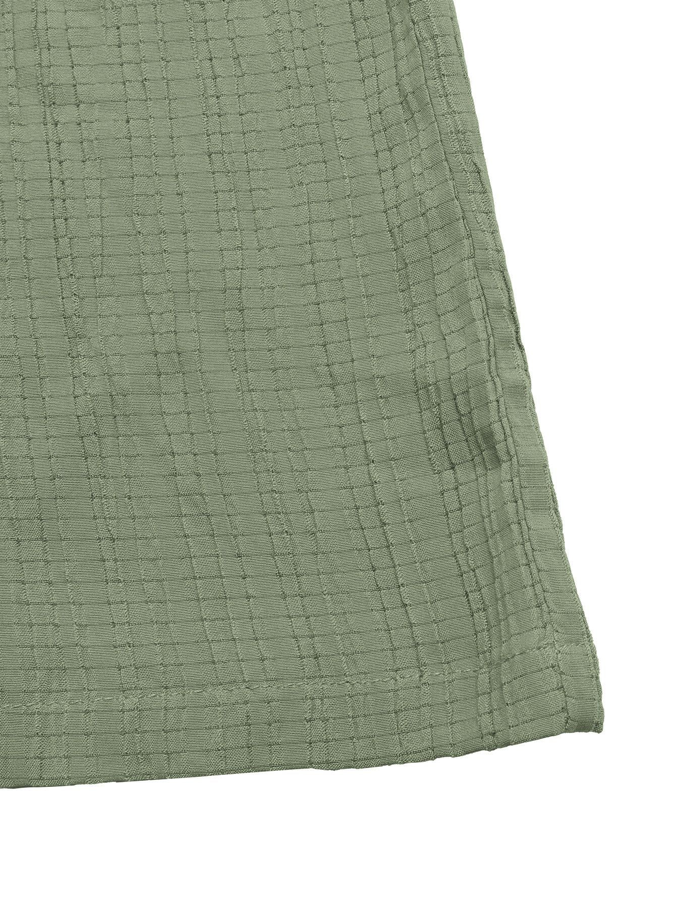 Tie waist wide leg jumpsuit in sage green with crinkled texture fabric.