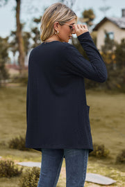 Dark Blue textured open-front cardigan with pockets and long sleeves.