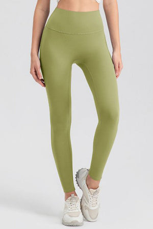 Matcha green high-waist performance leggings with sculpting seams.
