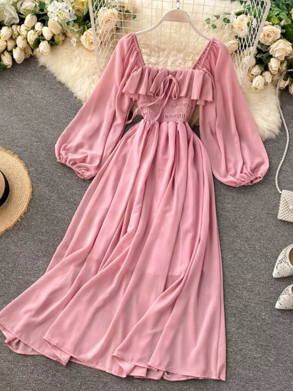 Pink ruffled square neck maternity dress with balloon sleeves and smocked waist