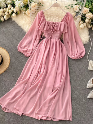Pink ruffled square neck maternity dress with balloon sleeves and smocked waist