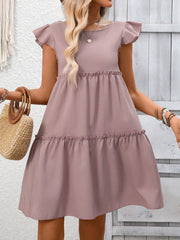 Light Purple ruffled cap sleeve mini dress with tiered skirt detail.
