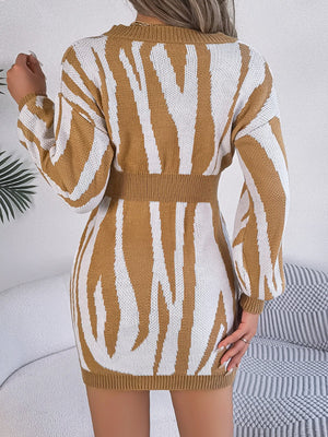Tan zebra stripe knit fit-and-flare dress with long sleeves and cinched waist.