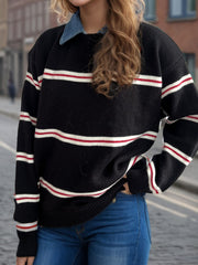 Black knit crewneck pullover sweater with red and white nautical stripes.